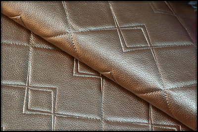 厂家直销现货供应移门PU面料与硬包皮革装饰革 环保阻燃皮料的全方位解析